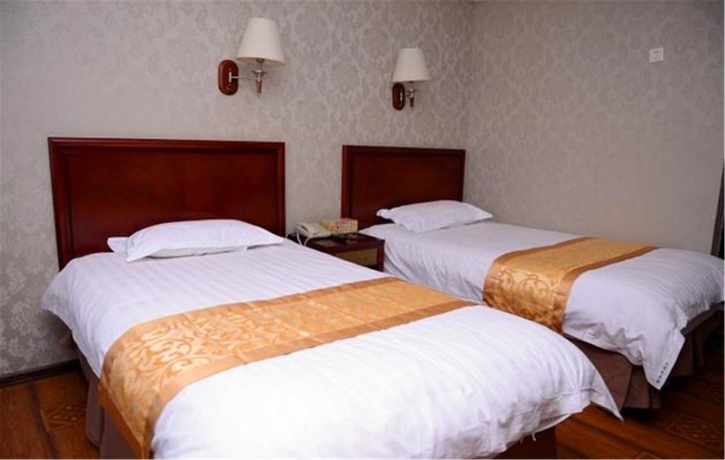 Двухместный (Двухместный номер Делюкс с 2 отдельными кроватями), GreenTree Inn Heilongjiang Harbin Zhongyang Street Business Hotel