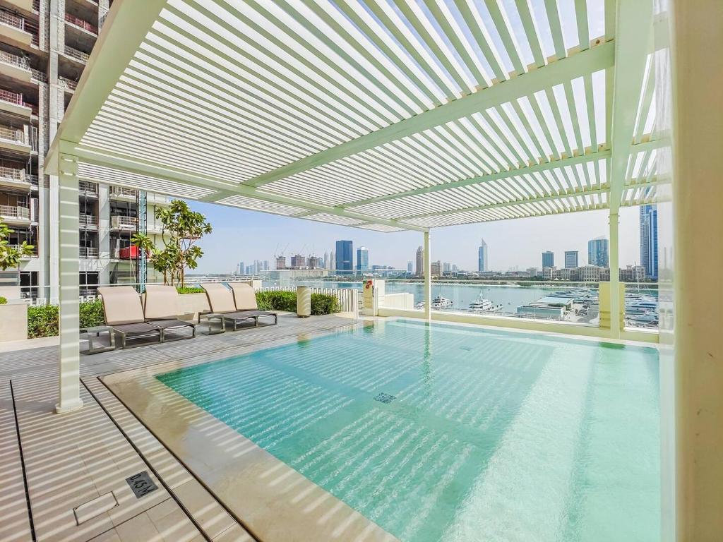 Deluxe Beachfront 4BR with Pool - Tap to explore photos
