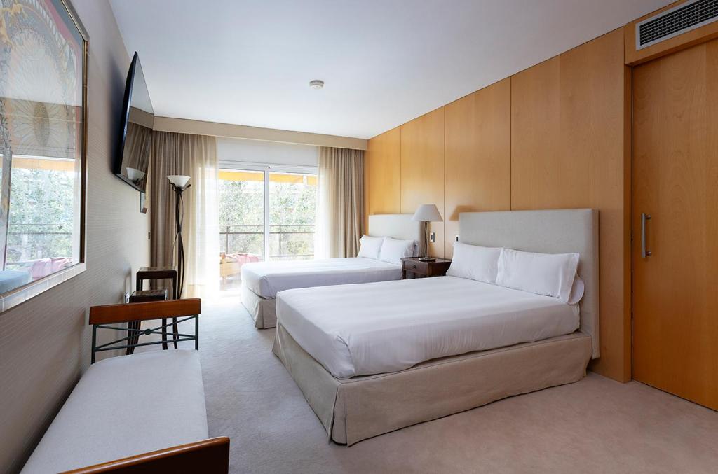 Suites del Mar Fenals Apartments - Tap to explore photos