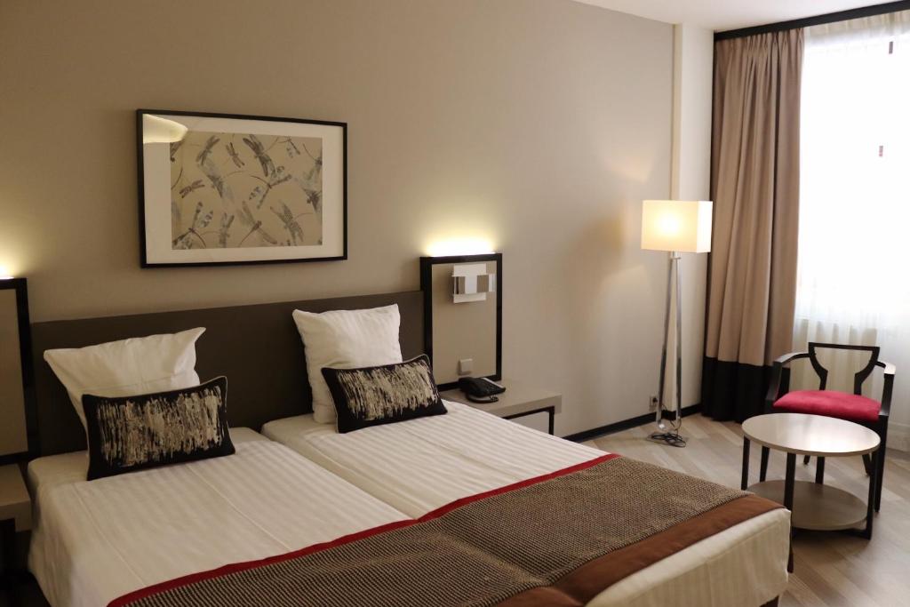 Hotel Floris Arlequin Grand-Place - Tap to explore photos