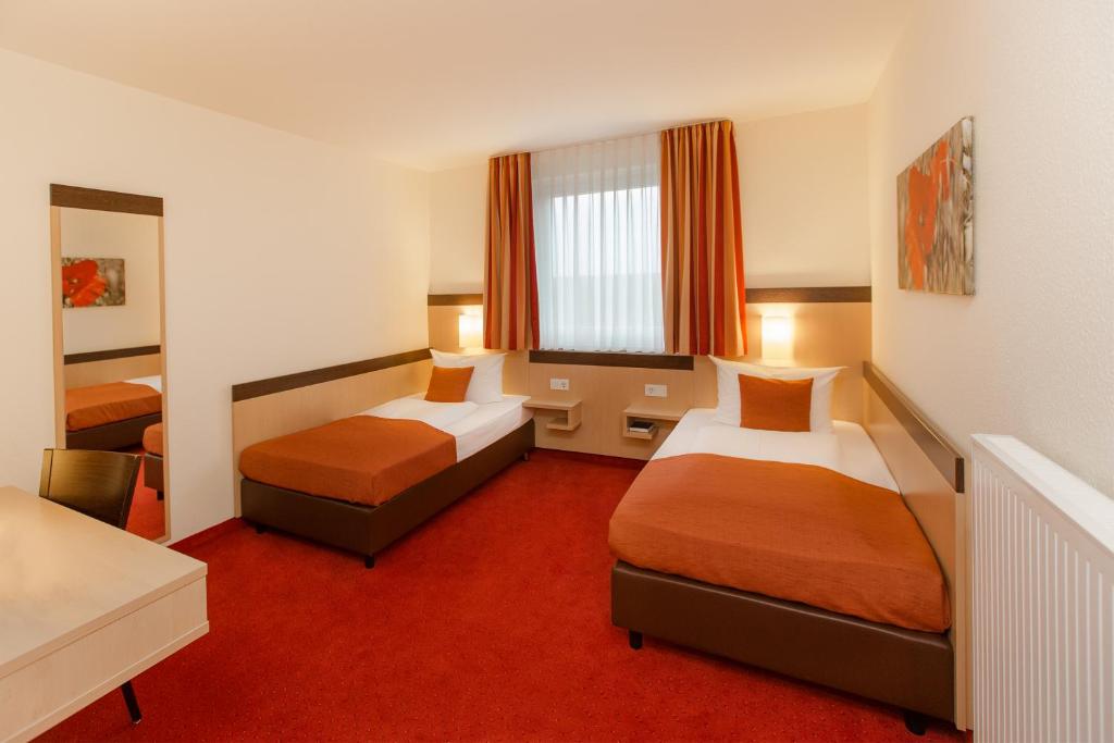 Двухместный (Двухместный номер с 2 отдельными кроватями), Montana-Hotel Ellwangen