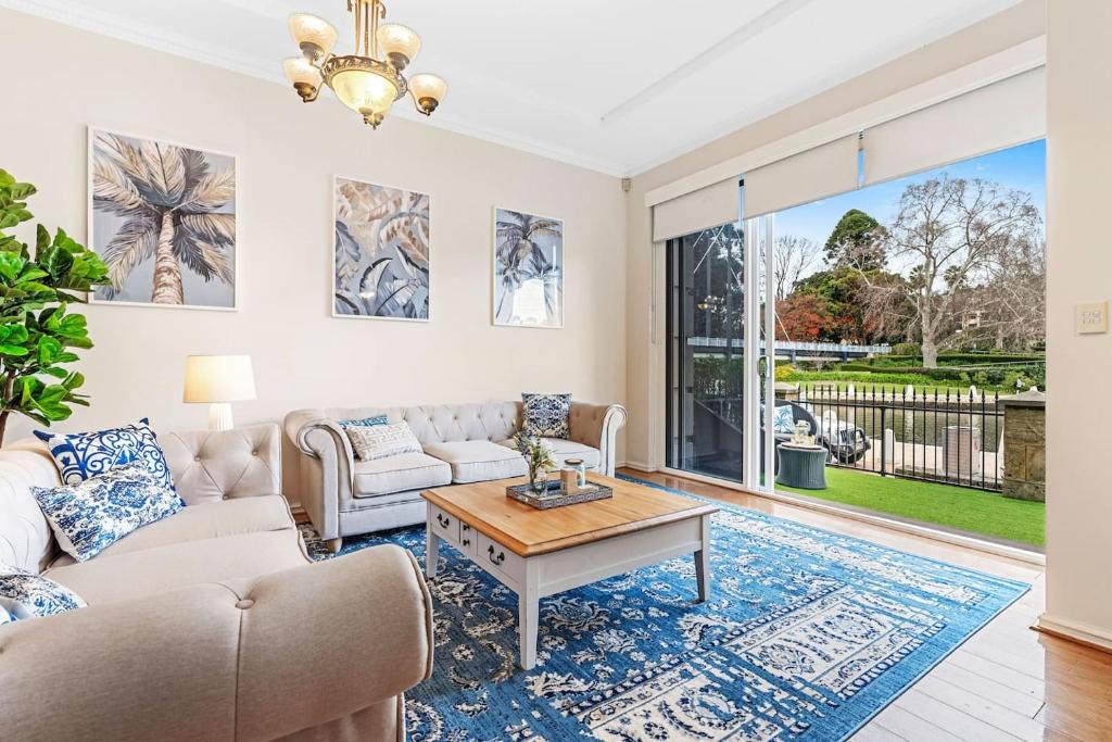 Hampton-Style Waterfront Mansion 3-Storeys of Lux - Tap to explore photos