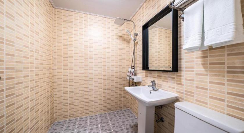 Check Inn Hotel Jeju - Tap to explore photos