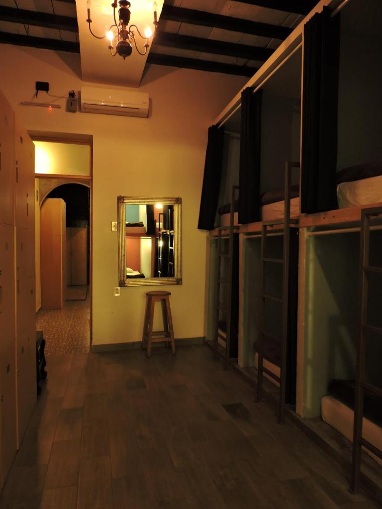 Номер (Односпальная кровать в общем номере для мужчин и женщин), Capsule Hostel