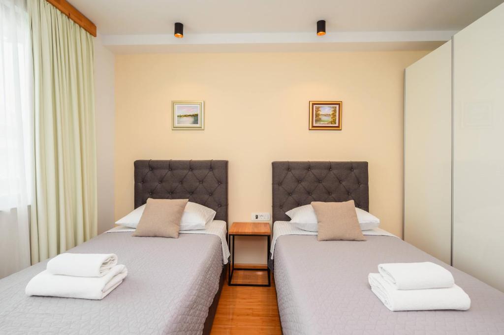 Boutique rooms Kican - Tap to explore photos
