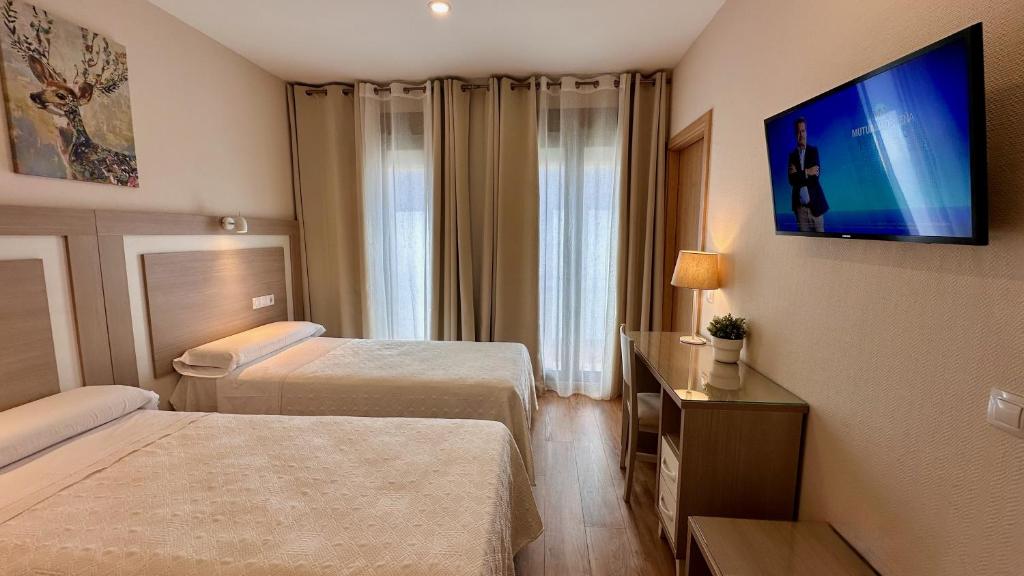 Hostal Toledo - Tap to explore photos