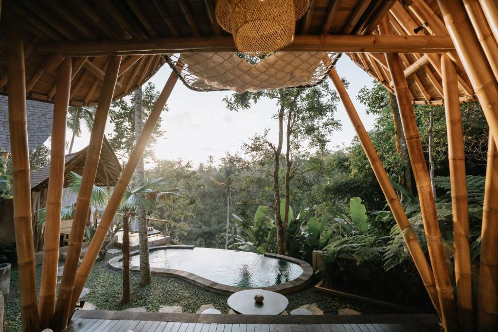 Umah Bali Kuno Villas - Tap to explore photos