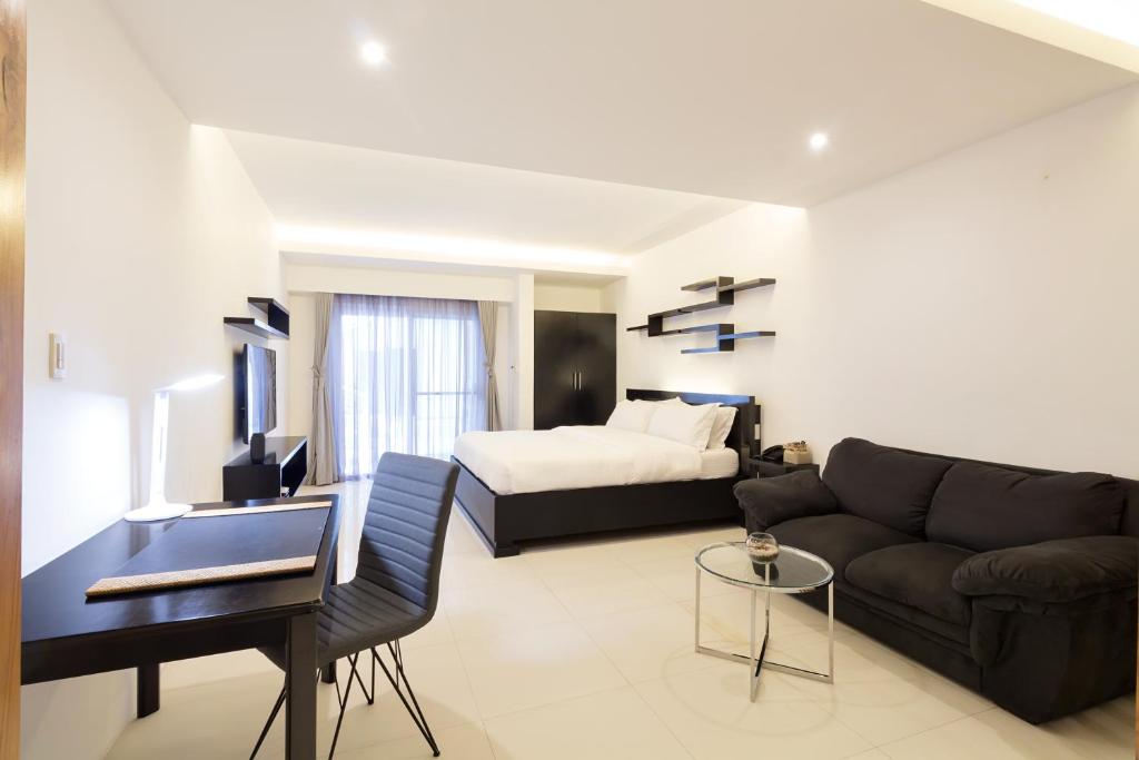 Winds Boutique Hotel - Tap to explore photos
