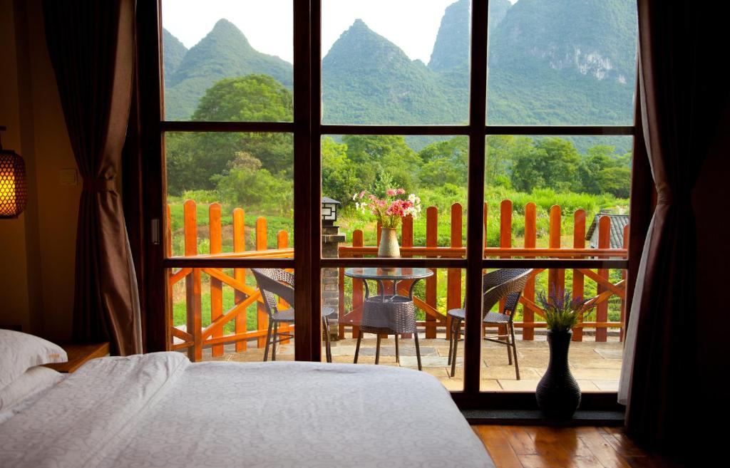 Двухместный (Номер Делюкс с кроватью размера «queen-size», вид на сад), Yangshuo Coco Garden Hotel