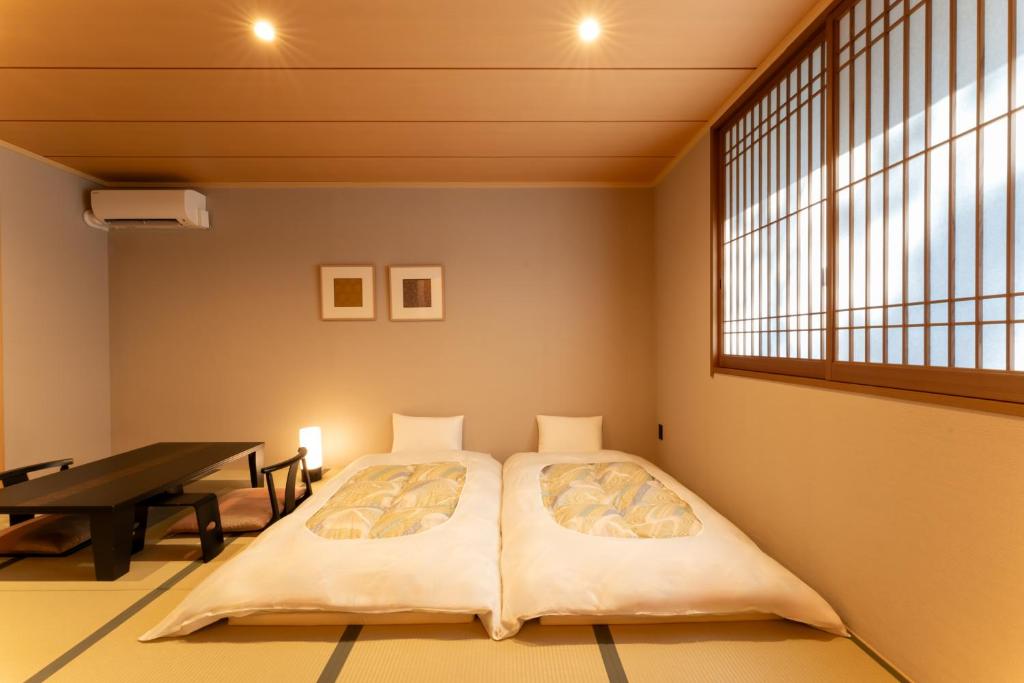Temple Town Hotel WAQOO Horyuji - Tap to explore photos