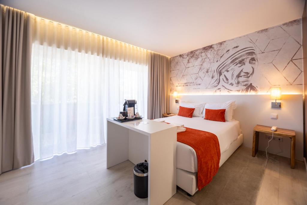 The ICONS Lisbon Hotel - Tap to explore photos