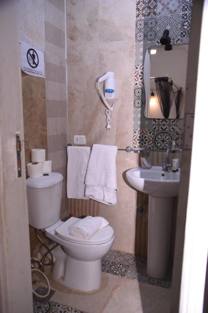 Arabian Nights Pyramids Guesthouse - Tap to explore photos