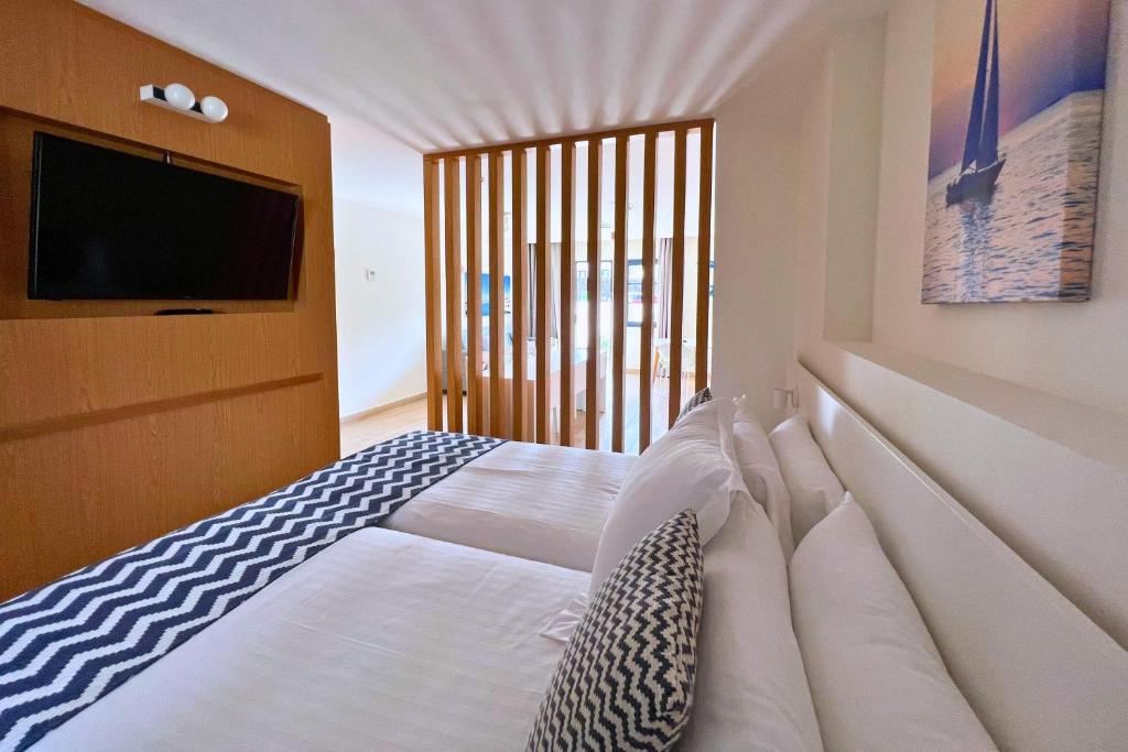 Hotel Cordial Marina Blanca - Tap to explore photos
