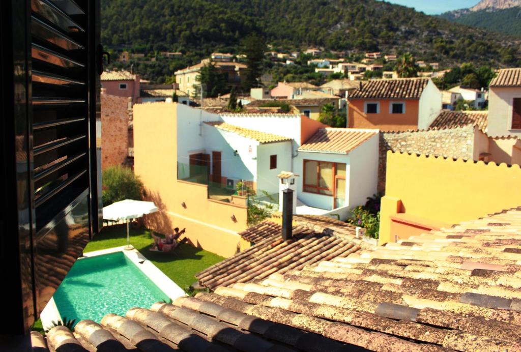 Petit Hotel Alaro - Tap to explore photos