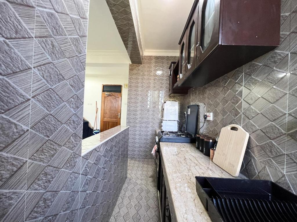 JV Stylish 1-Bed Dar es Salaam - Tap to explore photos