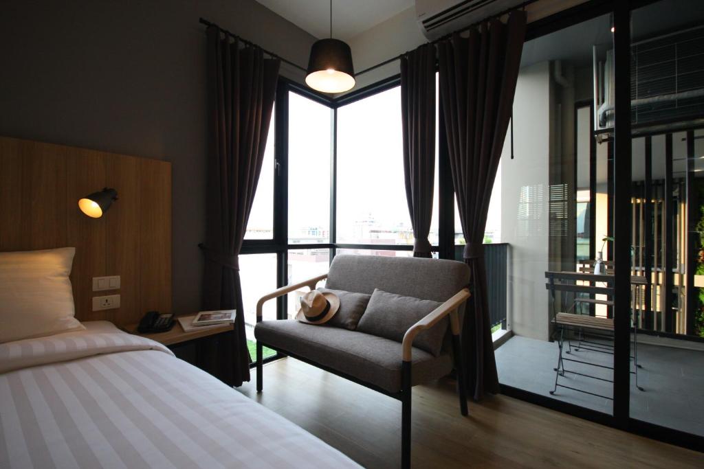 Mii Hotel Srinakarin - Tap to explore photos