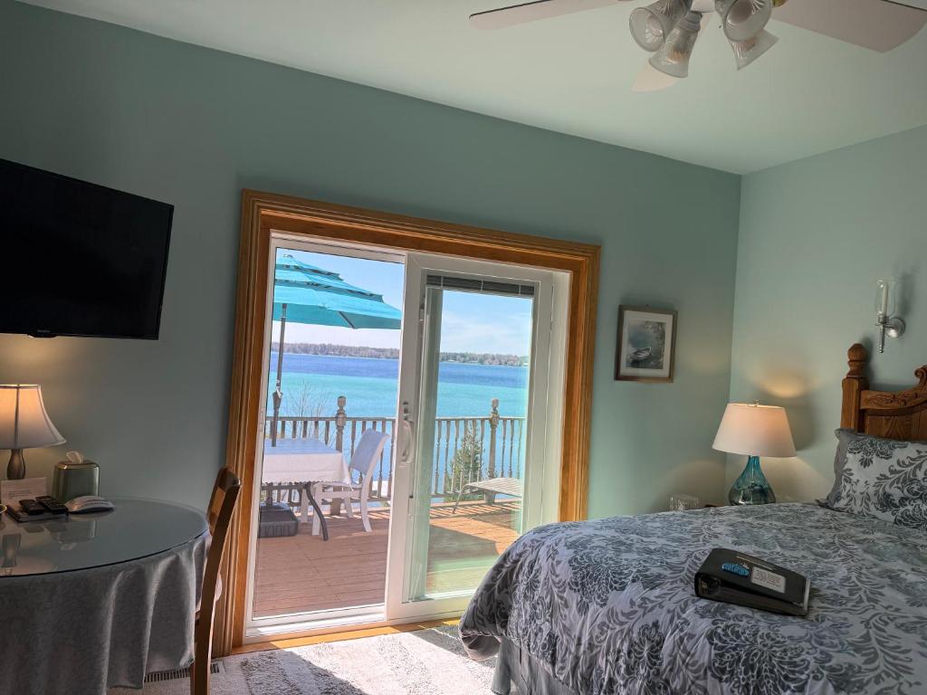 Torch Lake Bed & Breakfast - Tap to explore photos