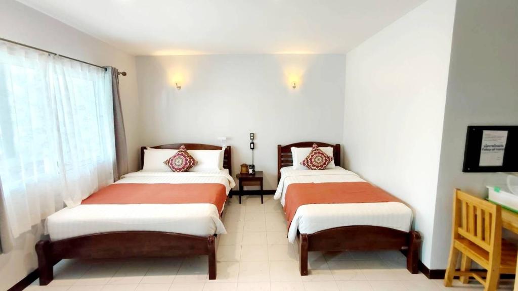 Talay Sai Hotel - Tap to explore photos