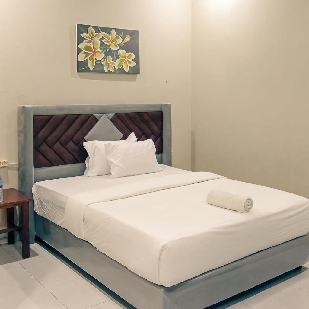 Ayu Homestay - Tap to explore photos