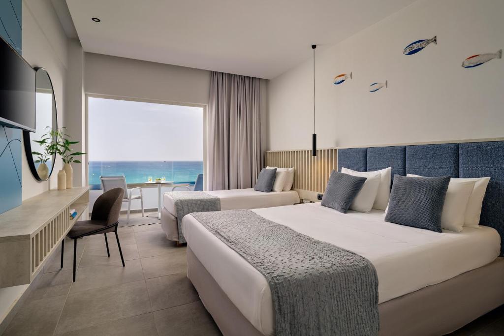 Blue Sea Beach Resort - Tap to explore photos