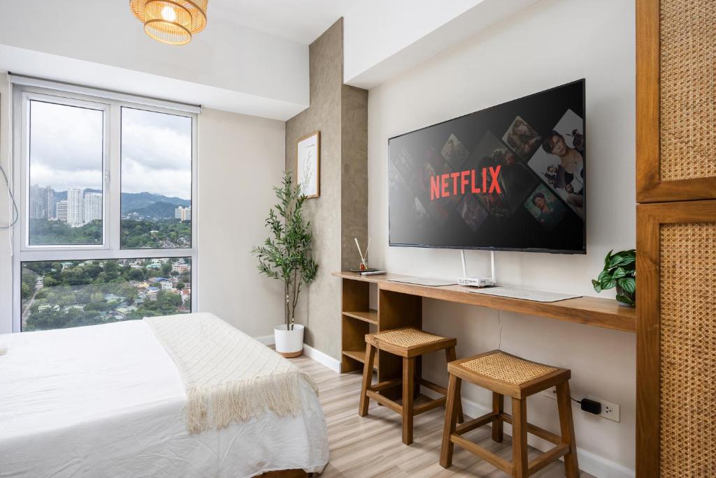 Virgo Nest Rentals - Avida Riala IT Park - City View - Tap to explore photos
