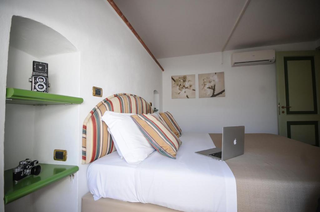 Tirreno Beachfront Apartments - Tap to explore photos