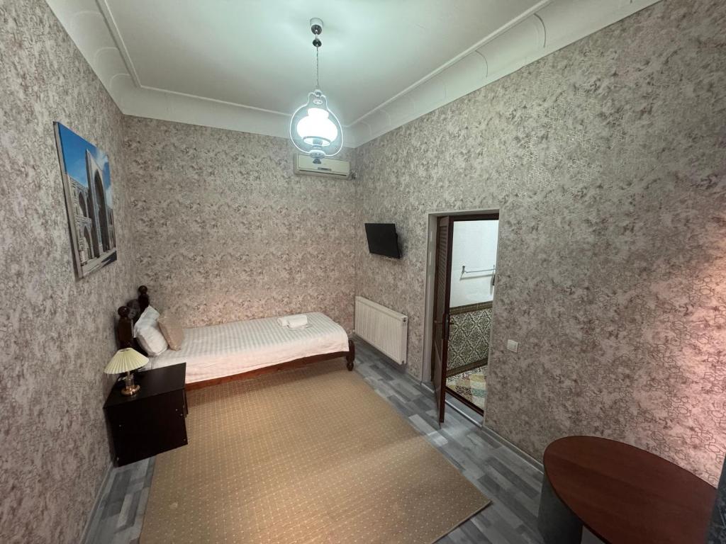 Hotel Ravshan Boutique - Tap to explore photos
