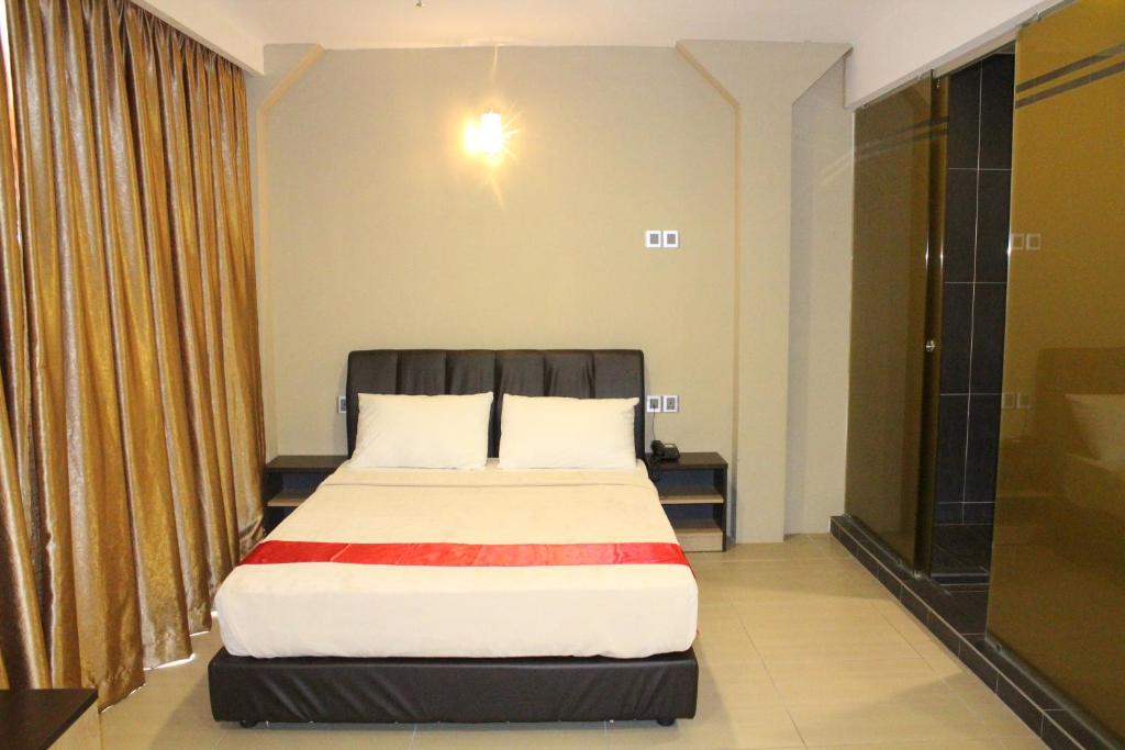Двухместный (Улучшенный номер с кроватью размера «queen-size»), T-Hotel Jalan Tar