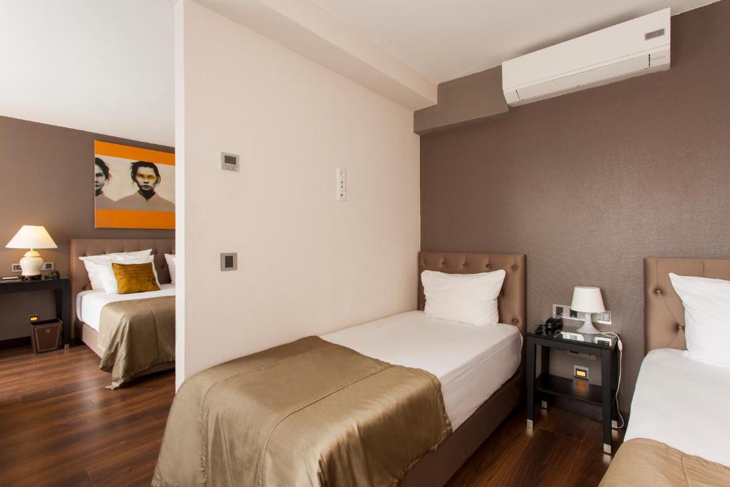 Четырехместный (Роскошный четырехместный номер с балконом), Quentin Berlin Hotel am Kurfürstendamm