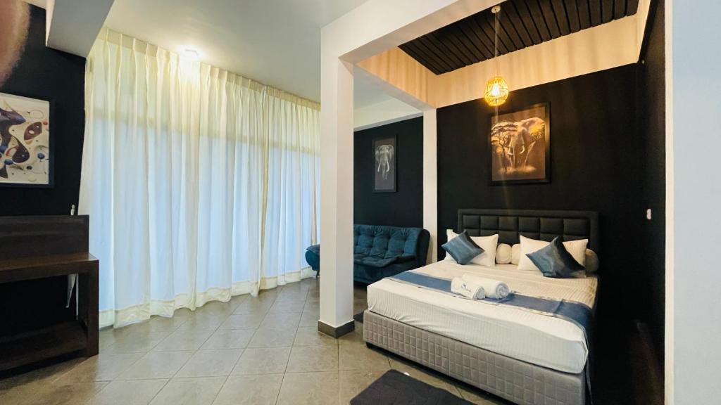 Blue Whale beach boutique Resort - Tap to explore photos