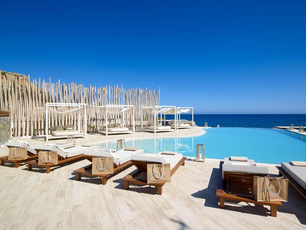 Artemis Seaside Resort - Tap to explore photos
