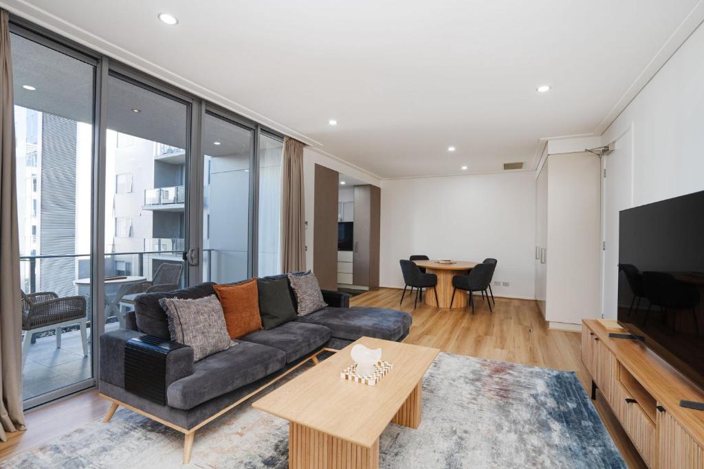 Modern 1-Bed Unit with Pool Views and Balcony - Tap to explore photos