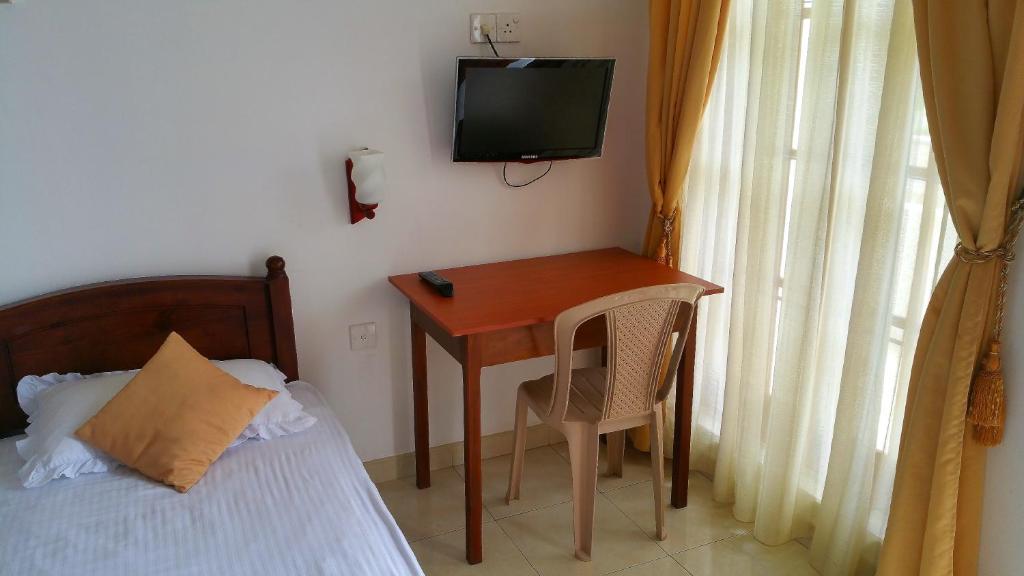 Двухместный (Двухместный номер Делюкс с 2 отдельными кроватями), Holiday Fashion Inn