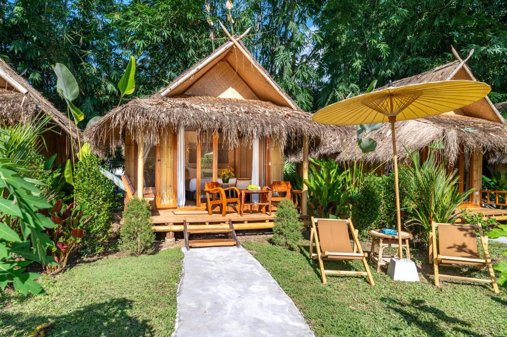 Pai Village Boutique Resort - Tap to explore photos