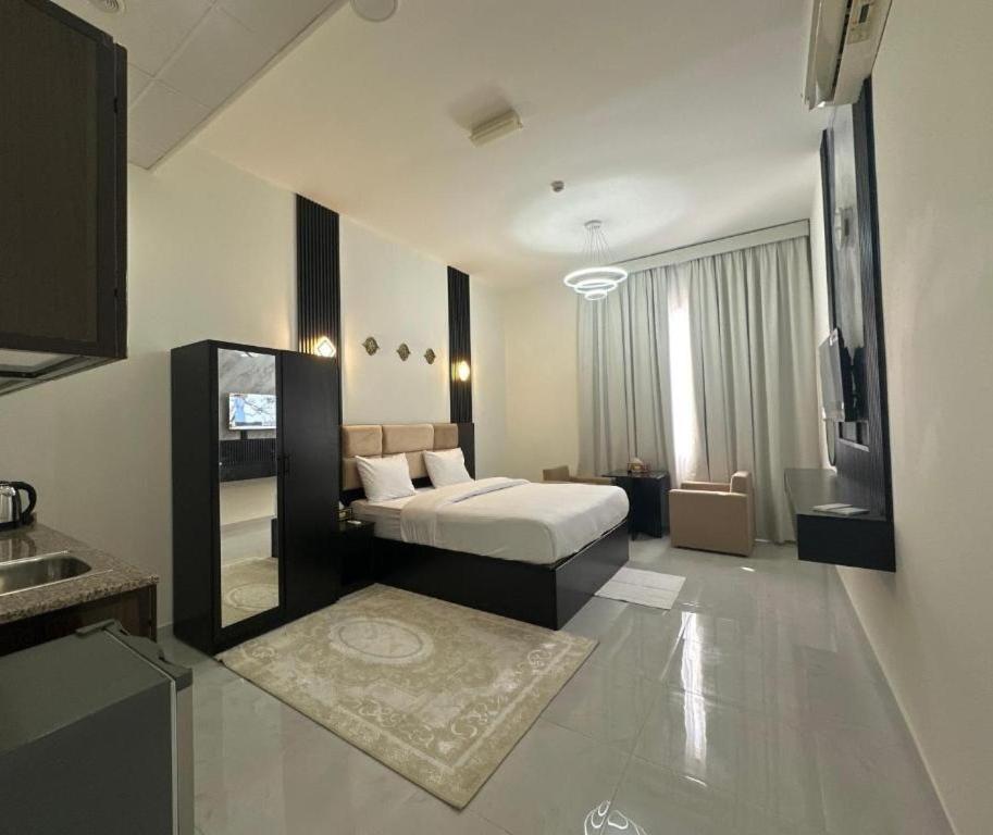 Al Zahra Hotel Apartments - Tap to explore photos