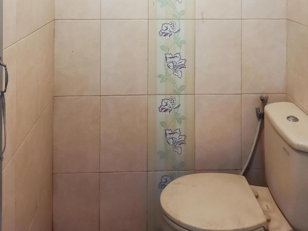 Hotel O Home Stay Kembar Syariah - Tap to explore photos