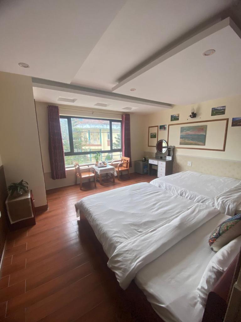 Sapa Global Hotel - Tap to explore photos