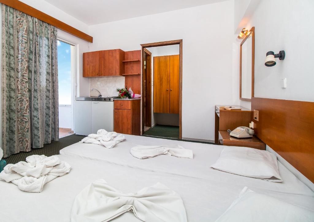 Двухместный (Двухместный номер с 2 отдельными кроватями), Achousa Hotel