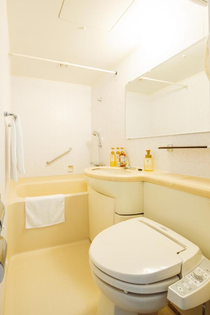 Nest Hotel Matsuyama - Tap to explore photos