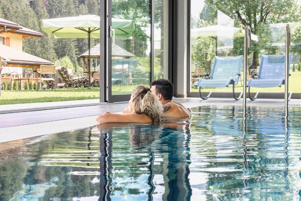 Wellness Hotel Dolomia - Tap to explore photos