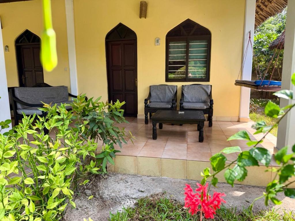 Kiwengwa Bungalow Boutique Resort - Tap to explore photos