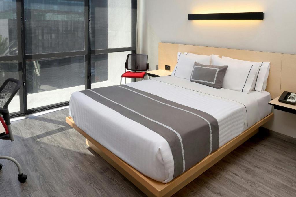 City Express Plus by Marriott Monterrey Galerias - Tap to explore photos