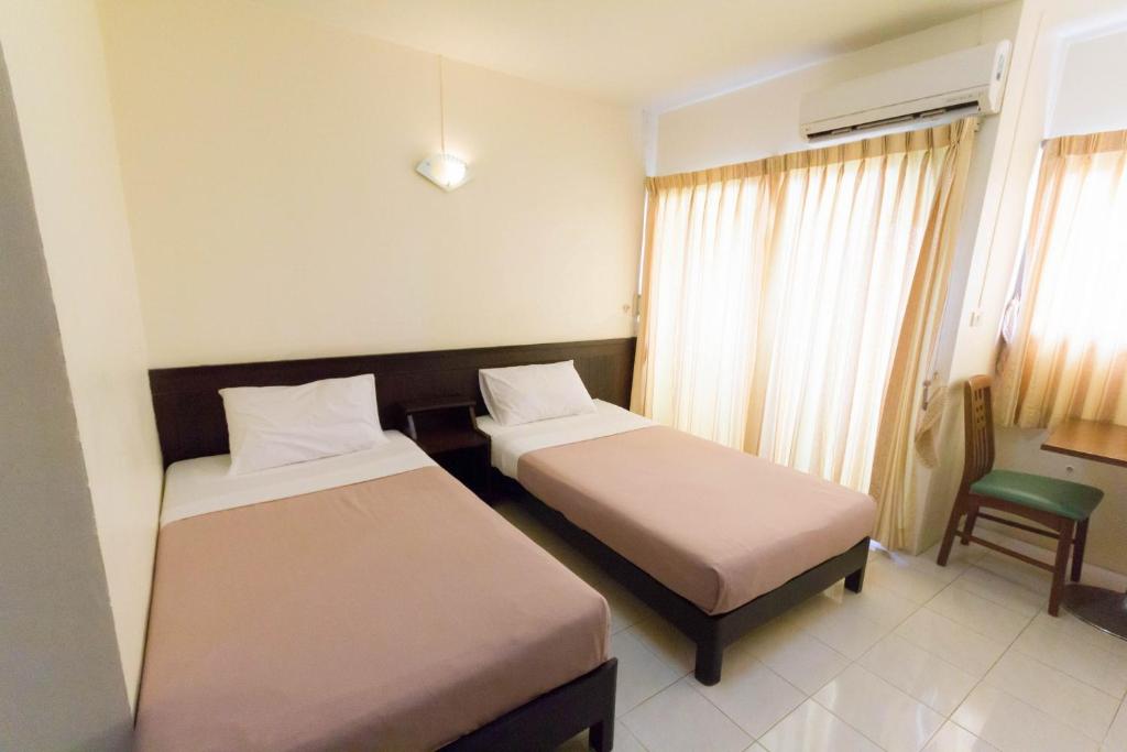 Mont Talay Hotel - Tap to explore photos