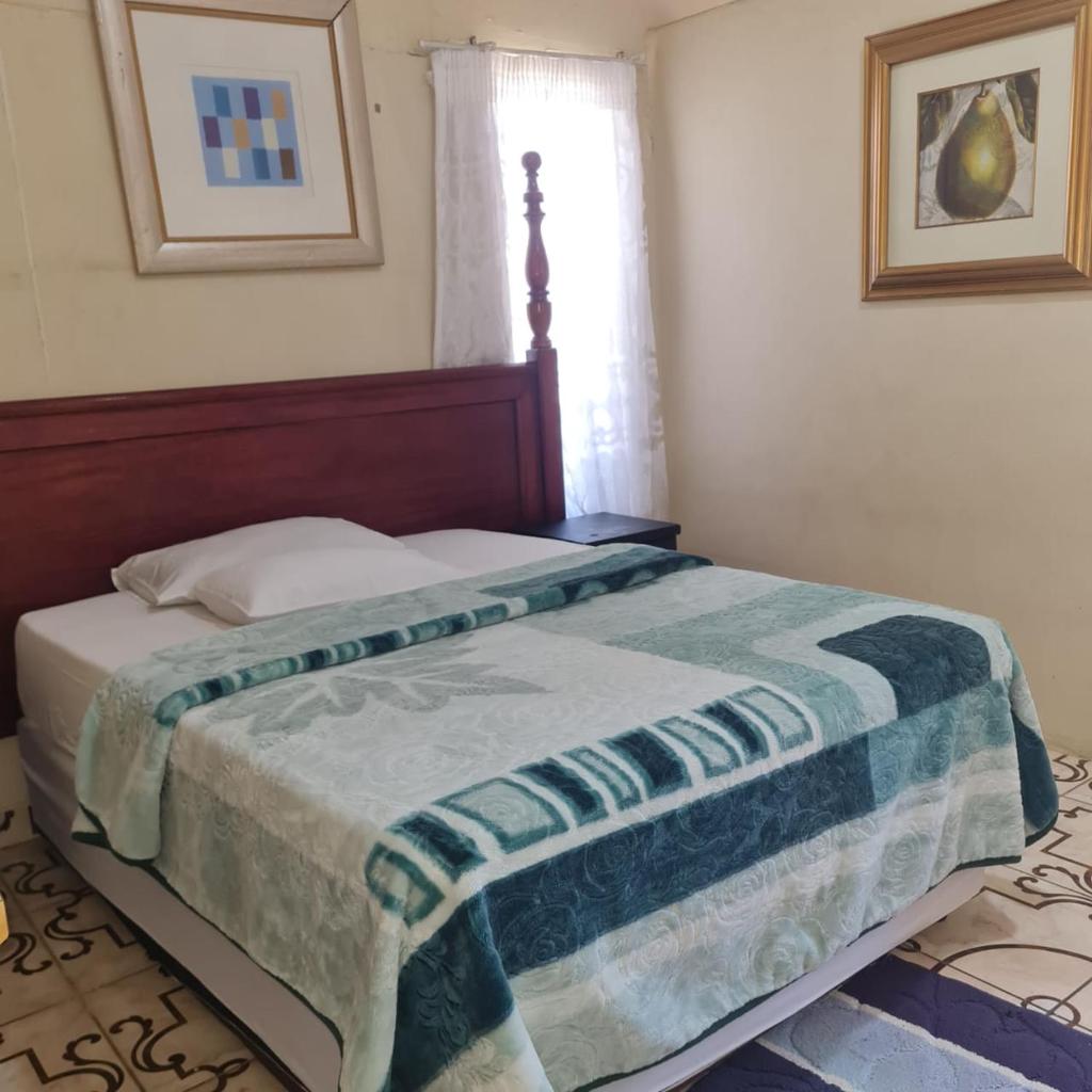 HostHub Guest House - Tap to explore photos