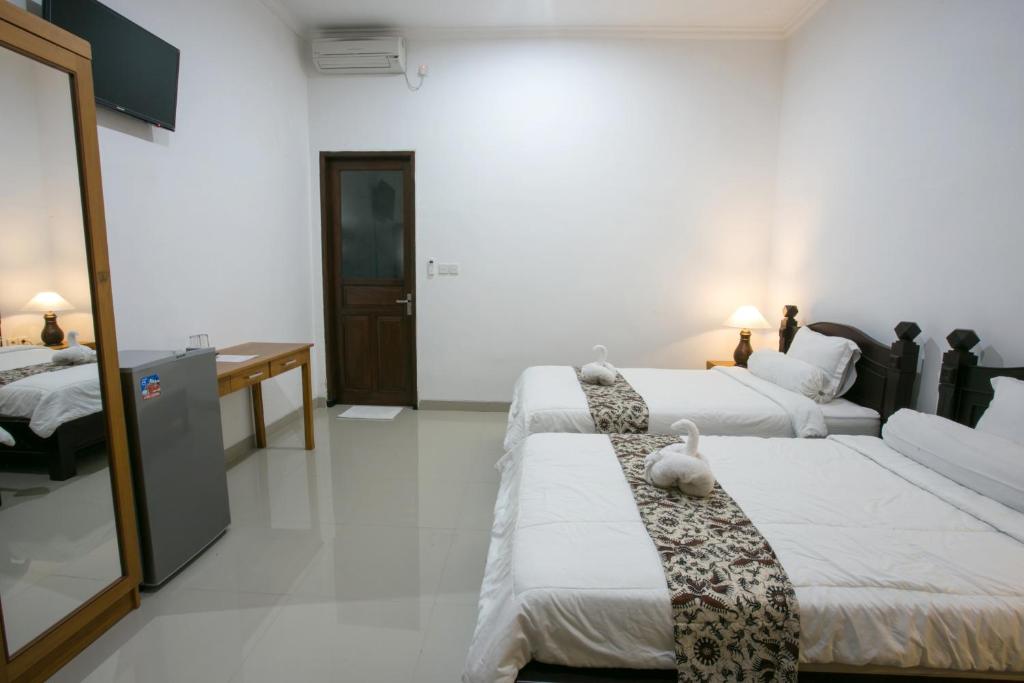 Двухместный (Двухместный номер с 2 отдельными кроватями), Wijaya Guesthouse