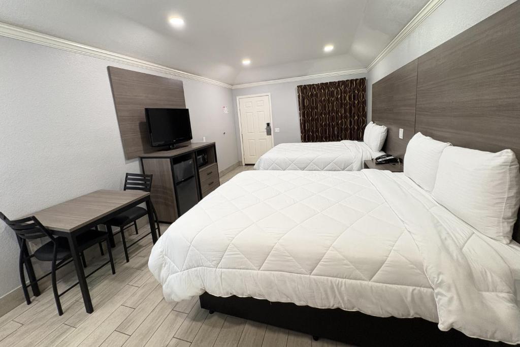 Kiwi Inn Capital O Houston - Hwy 249 Room Type - 2 Queen Beds Accessible Non-Smoking
