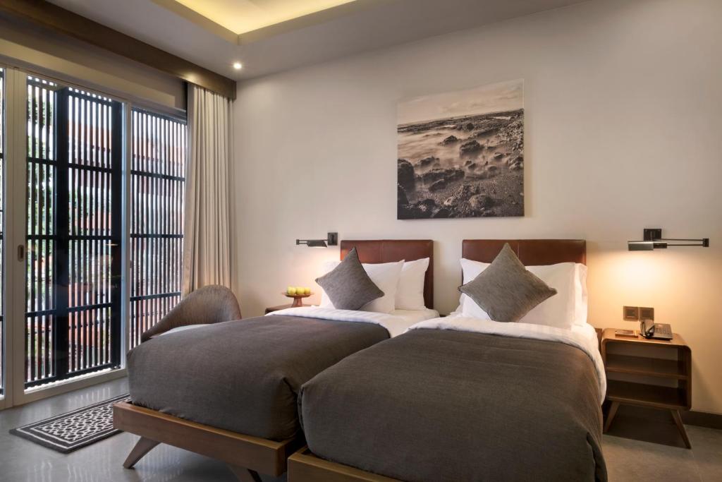 Akana Boutique Hotel Sanur - Tap to explore photos