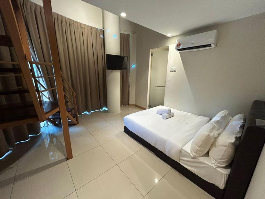 Swing and Pillows at PJ KD Room Type - Duplex Studio