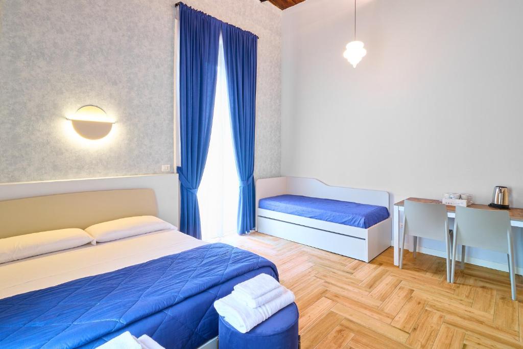 Toto e Peppino Luxury Rooms - Tap to explore photos