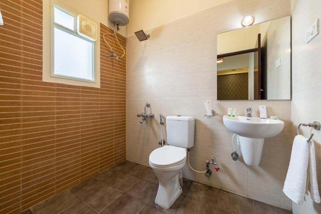 Двухместный ([Sanitized] Deluxe Double or Twin Room), Treebo Nestlay Casa